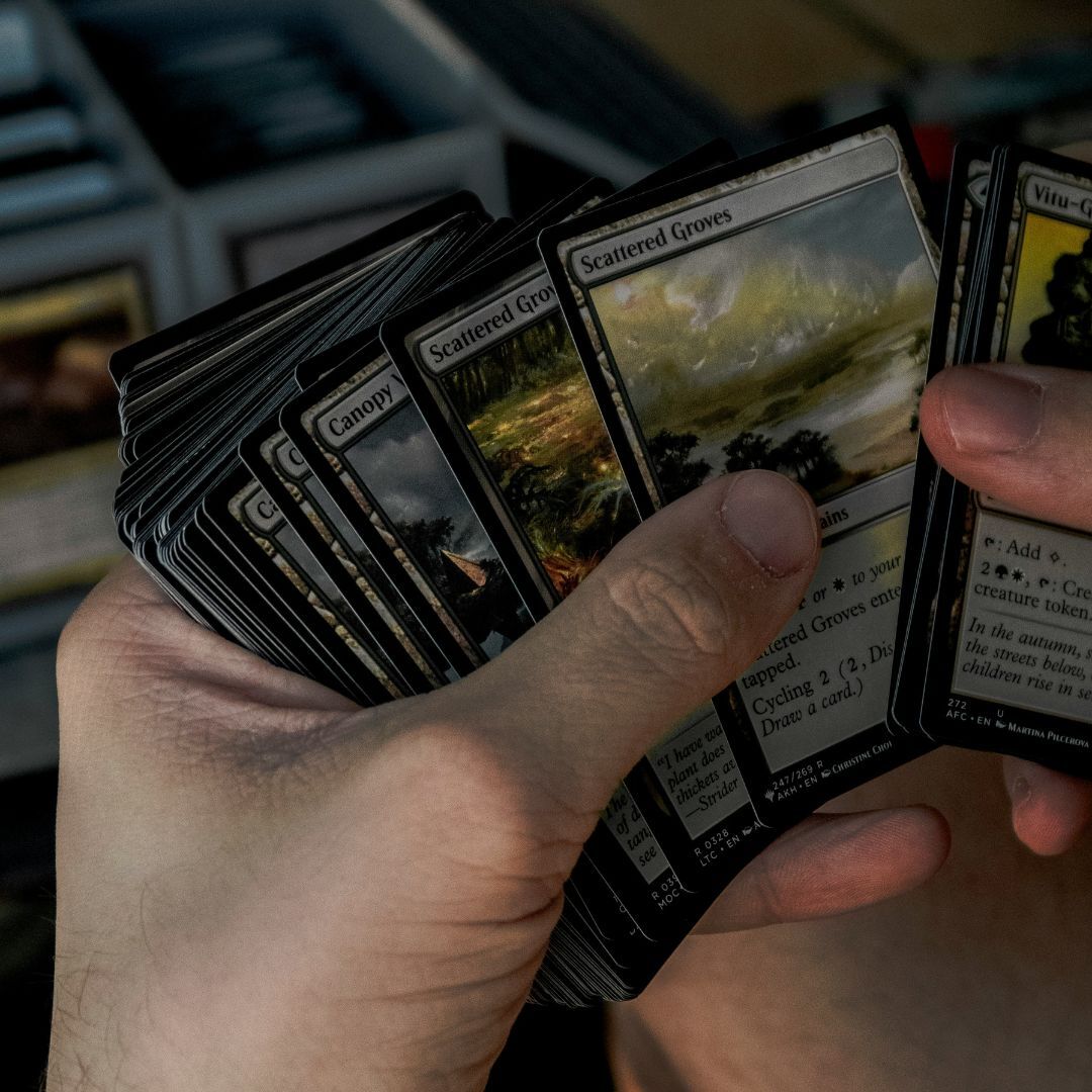 holding hand of cards